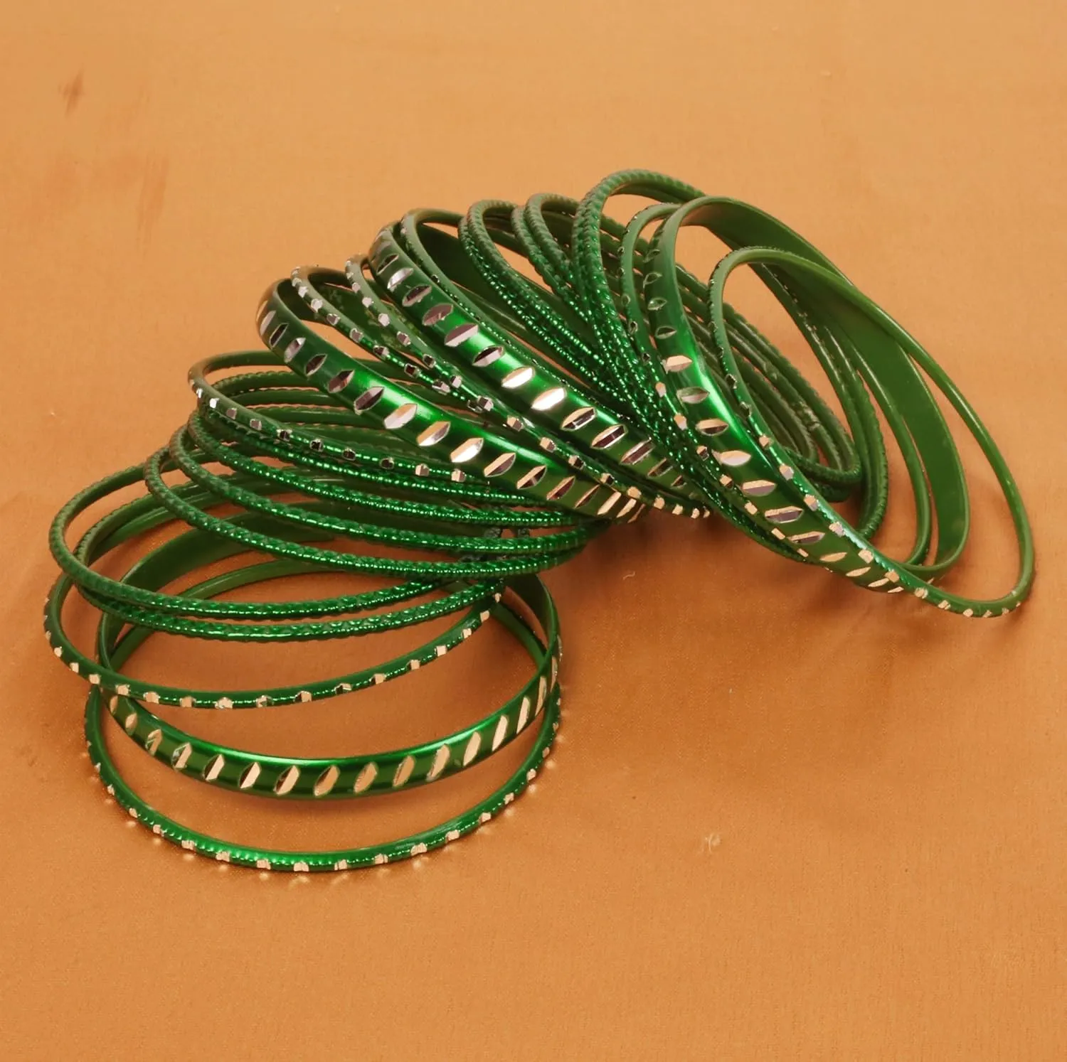 Touchstone Indian Bollywood Fashion Handcrafted Cut Metal Grain Work Textured Wrist Beautifier Magical Designer Jewelry Bangle Bracelets. Set of 24. for Women.