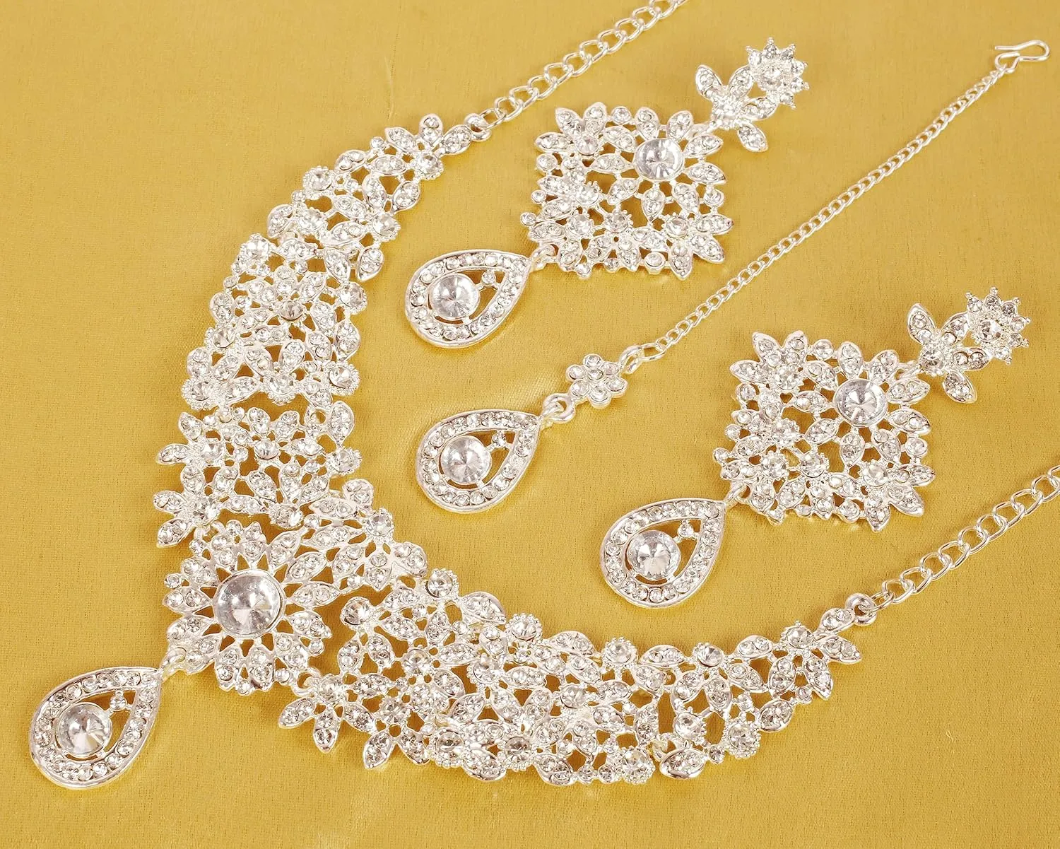 Touchstone Indian Jewelry Sets for Women Bollywood Necklace Earring Wedding high Fashion Victorian Formal Style Jewellery desi Artificial Imitation joyeria Rhinestone in Antique Gold or White Tone.